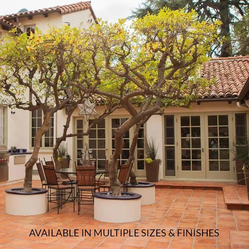 Mexican Tiles: terracotta-colored tiles across a tree-shaded courtyard