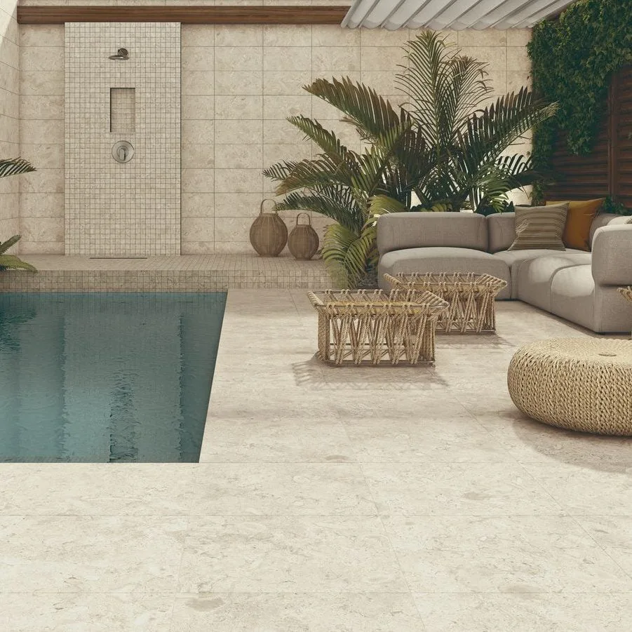 Nautica lookbook: pale floor tiles around a pool and outdoor seating